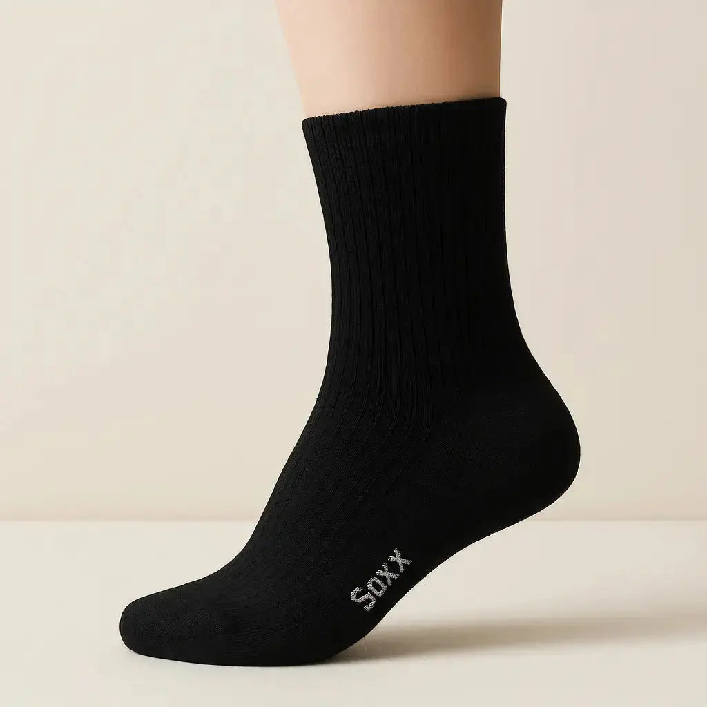 Chaussettes enfants Couleurs noir coton mollet sur pied mannequin