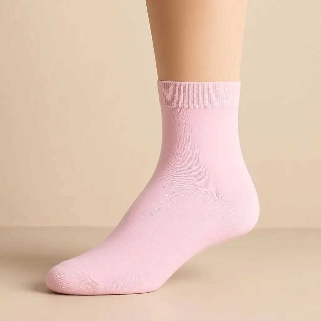 Chaussettes femmes Couleurs rose clair en coton mollet sur pied mannequin