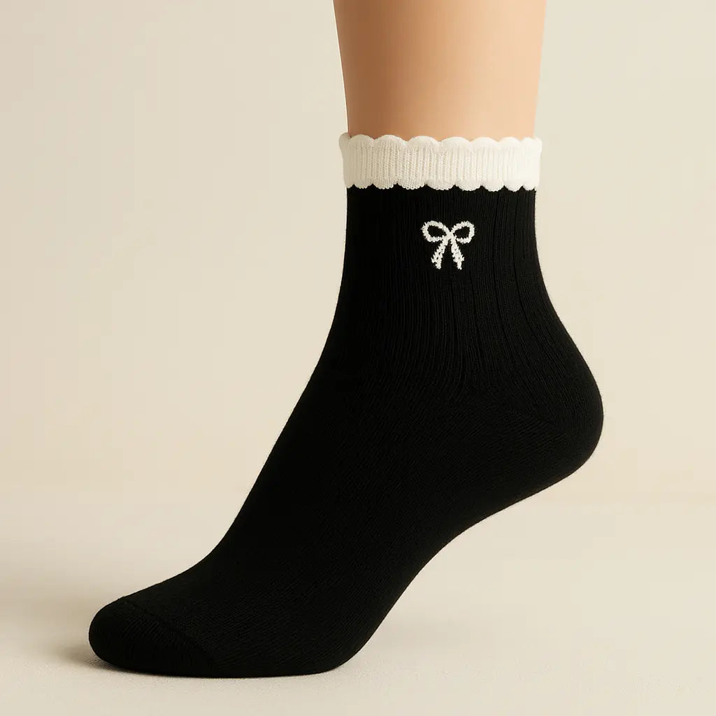 Chaussettes femme Noeuds noir coton mi-mollet sur pied mannequin