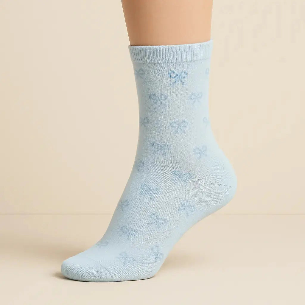 Chaussettes femmes Noeuds bleu coton mi-mollet sur pied mannequin