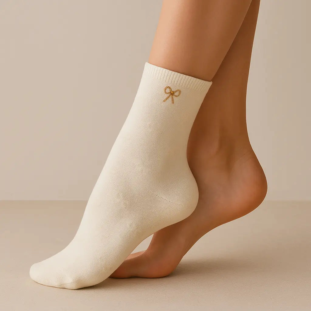 Chaussettes femmes Noeuds jaune coton mi-mollet sur pied mannequin