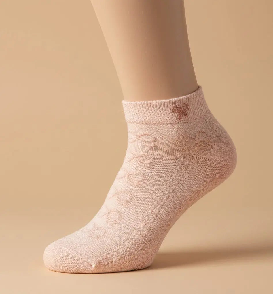 Chaussettes courtes SOXX.shop rose pâle en coton peigné avec motif nœud décoratif et bord-côte ajusté