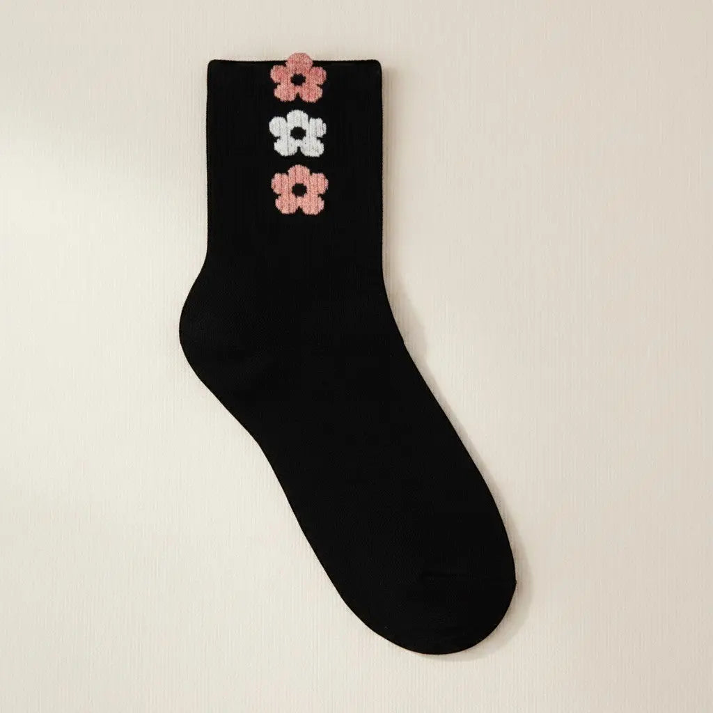 Chaussettes mi-mollet SOXX.shop noires en coton peigné avec trois petites fleurs brodées roses et blanches